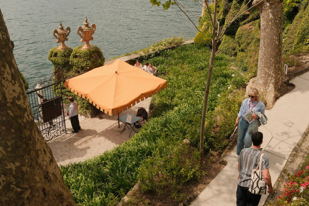 Journalist interviewing a local resident outdoors