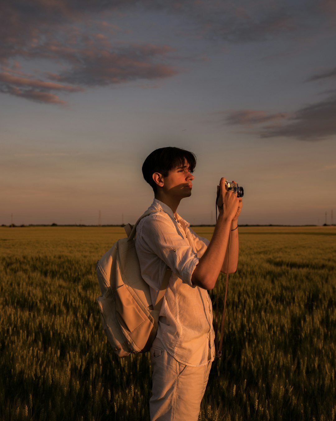 young man in fields