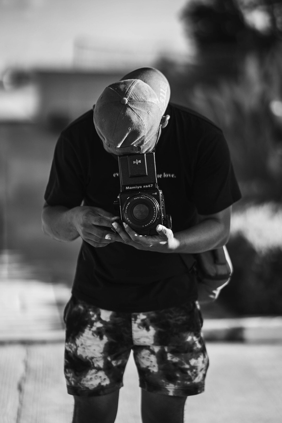 Danish male documentary photographer holding a camera